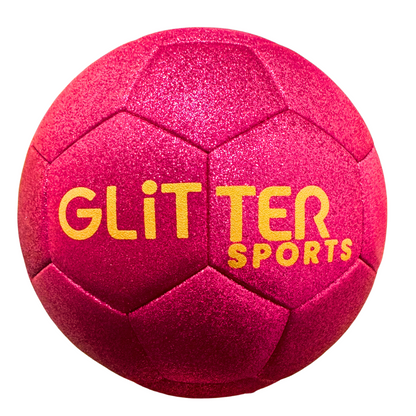 Bright pink soccer ball with gold 'Glitter Sports' logo on white background. Logo printing is slightly misaligned.