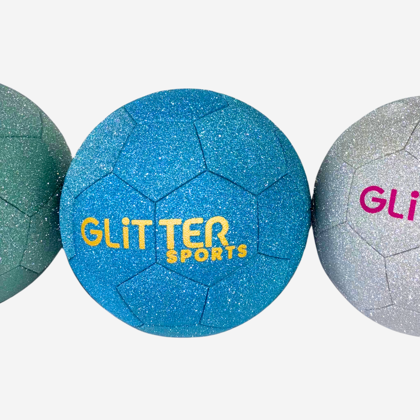 Blue glitter soccer ball with gold 'Glitter Sports' logo in the middle of partial view of silver and green versions on white background.