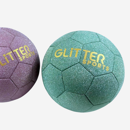 Size 3 mint green glitter soccer ball with gold 'Glitter Sports' logo next to pink glitter soccer ball on white background.