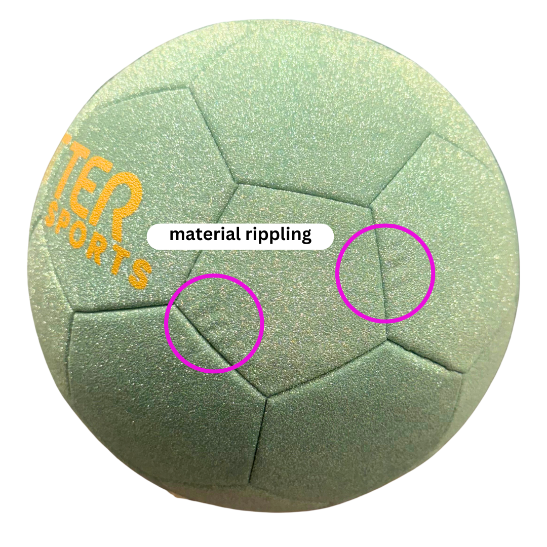 Size 5 light green glitter soccer ball with minor rippling in exterior identified within pink circles with note above reading 'material rippling' on white background.