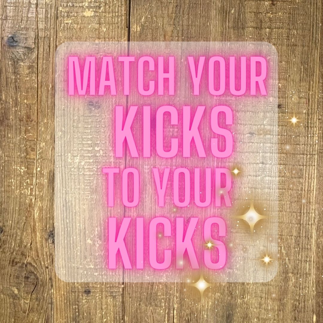 Logo image reading 'Match your kicks to your kicks' in pink font with gold sparkle on wood background.