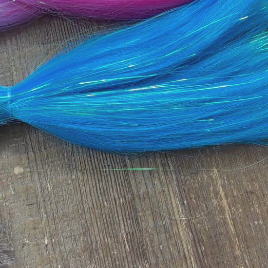 Flyover of Disney princess girls ombre rainbow tinsel hair extension braid collection including pinks, blue, purple, silver and golden yellow.